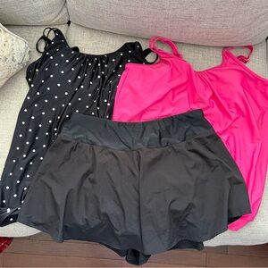 Black Polka Dot and Pink Bathing Suit Tops and a pair of swim shorts